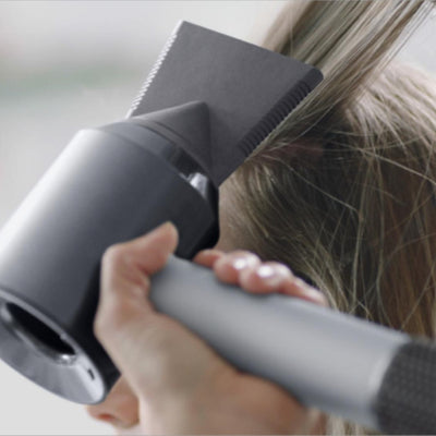 Dyson Supersonic™ Hair Dryer Professional Edition (Nickel/Silver) in use